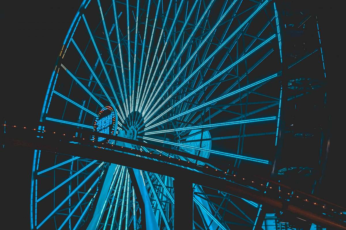 amusement park blue Ferris wheel at night the santa monica pier